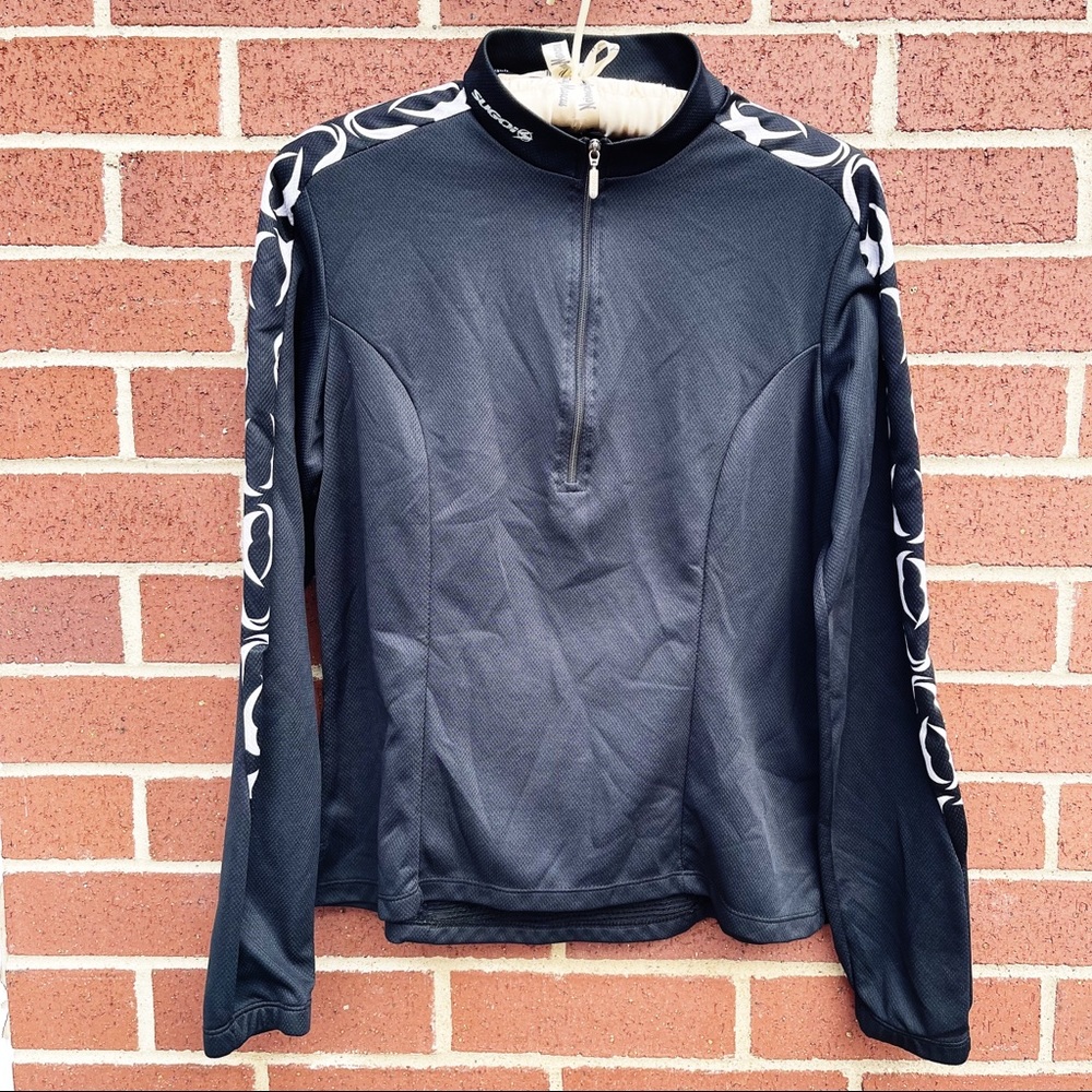 SUGOI Technifine Long Sleeve Cycling Jersey. Half Zip Front. Zip Back Pocket.